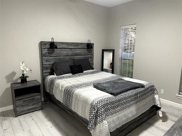 bedroom featuring light wood-type flooring