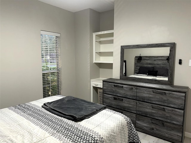 bedroom with light hardwood / wood-style floors