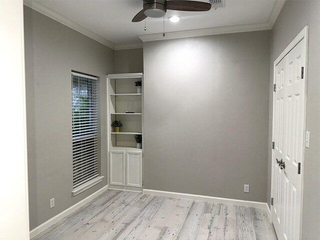 unfurnished room with ceiling fan, ornamental molding, and light wood-type flooring