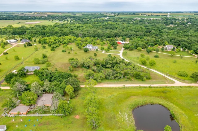 bird's eye view featuring a rural view and a water view