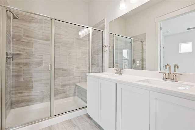 bathroom featuring vanity and walk in shower