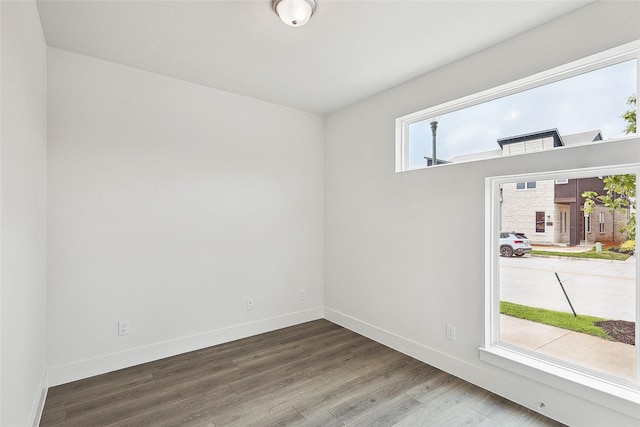 spare room featuring hardwood / wood-style floors