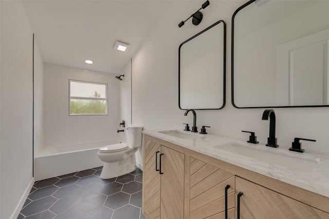 full bathroom featuring shower / bathtub combination, tile patterned flooring, vanity, and toilet