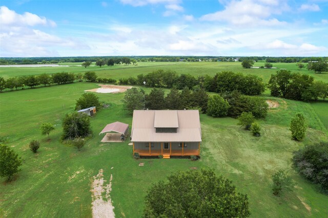 birds eye view of property featuring a rural view