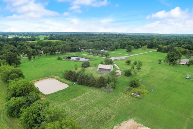 drone / aerial view featuring a water view and a rural view