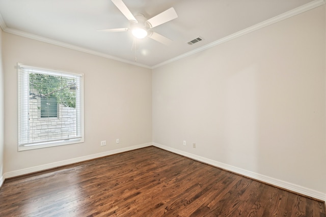 empty room featuring crown molding, dark hardwood / wood-style flooring, and ceiling fan