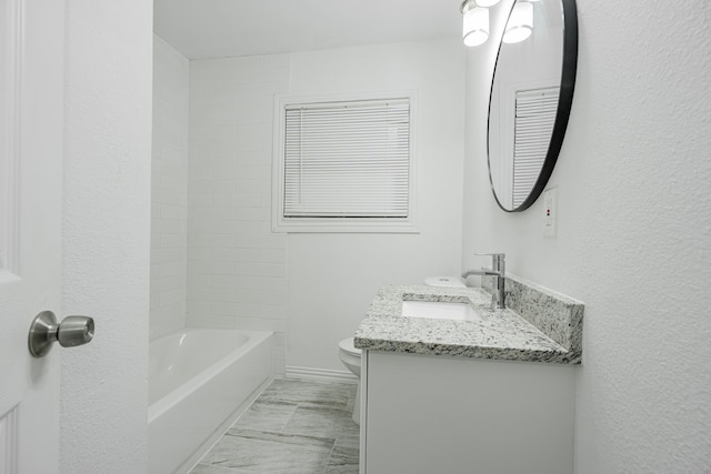 full bathroom featuring dual vanity, toilet, tiled shower / bath, and tile flooring