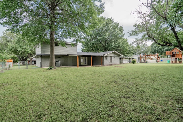 view of yard with a playground