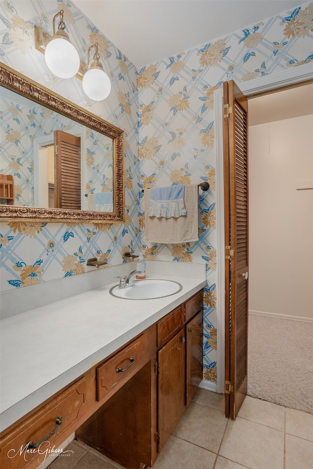 bathroom featuring tile floors and large vanity