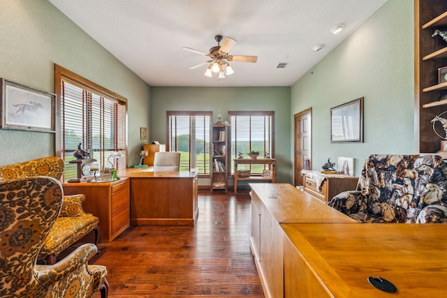 office area with dark hardwood / wood-style flooring and ceiling fan