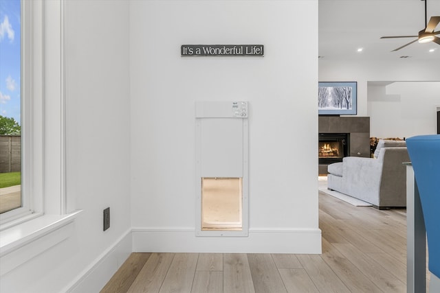 corridor featuring light hardwood / wood-style floors