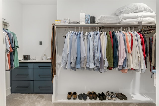 spacious closet featuring carpet floors