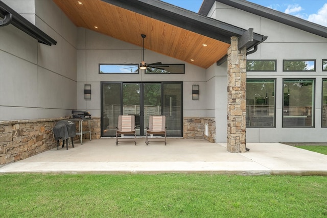 view of patio featuring ceiling fan