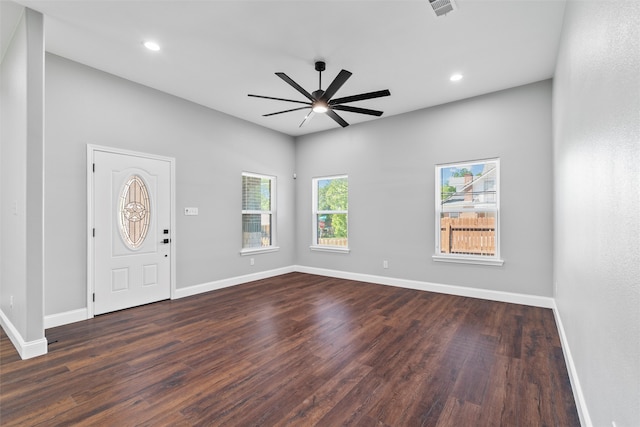 entrance foyer featuring dark hardwood / wood-style flooring and ceiling fan