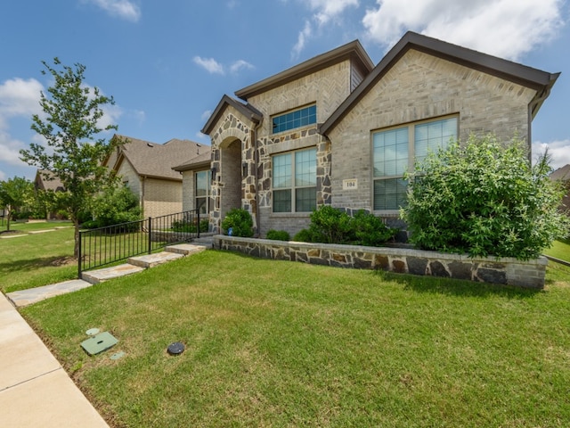 view of front of house featuring a front lawn