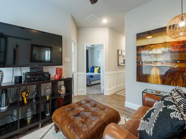 living room with light hardwood / wood-style flooring