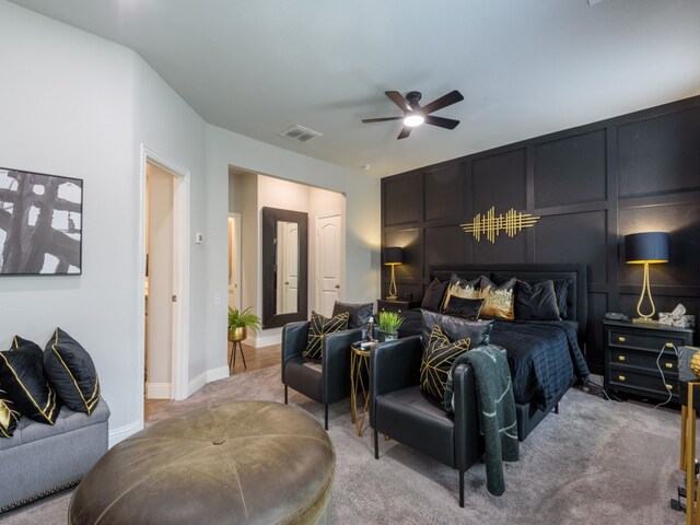 carpeted bedroom featuring ceiling fan