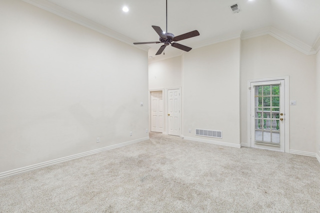 carpeted empty room featuring crown molding, high vaulted ceiling, and ceiling fan