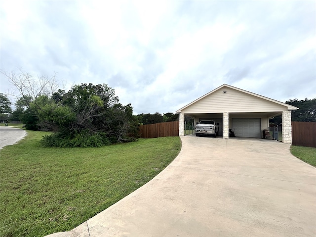 exterior space with a yard and a carport