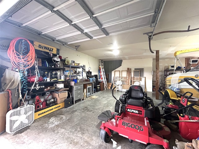 garage with a workshop area