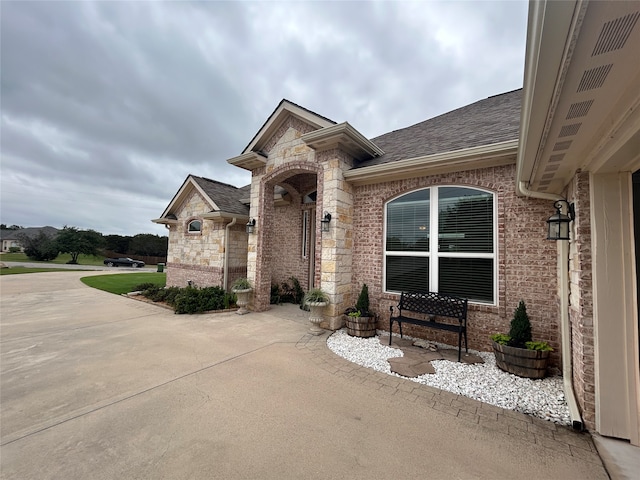 view of front of home with a patio