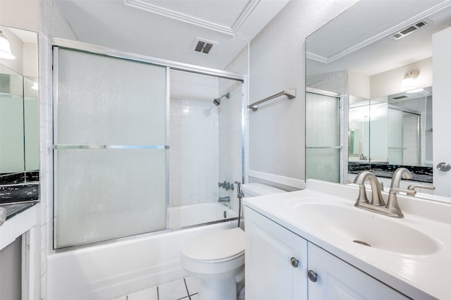 full bathroom with enclosed tub / shower combo, toilet, tile floors, and vanity