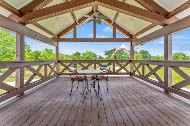 wooden terrace with ceiling fan and a gazebo