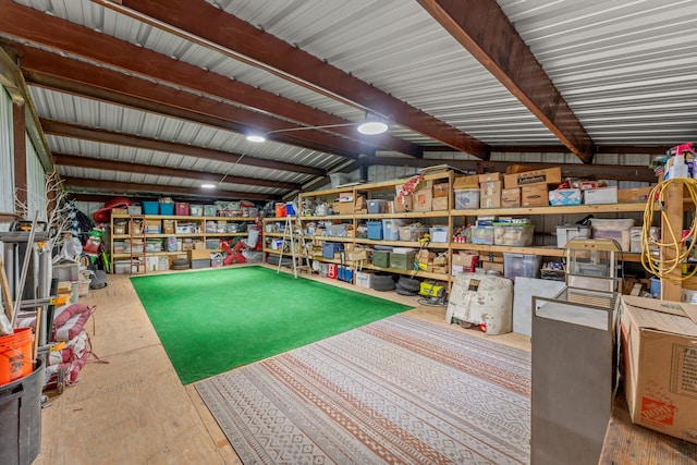 playroom with lofted ceiling with beams