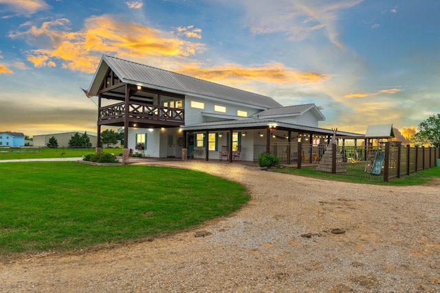 view of outdoor building at dusk