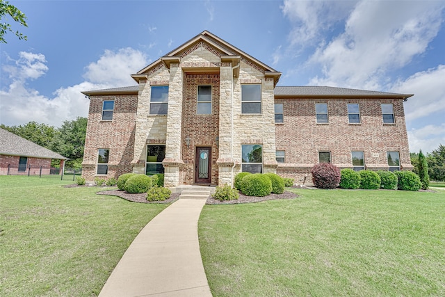 view of front facade featuring a front yard