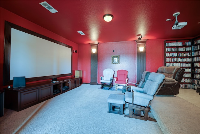 cinema room featuring carpet