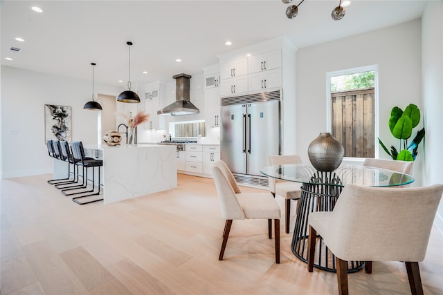 dining area featuring light hardwood / wood-style floors