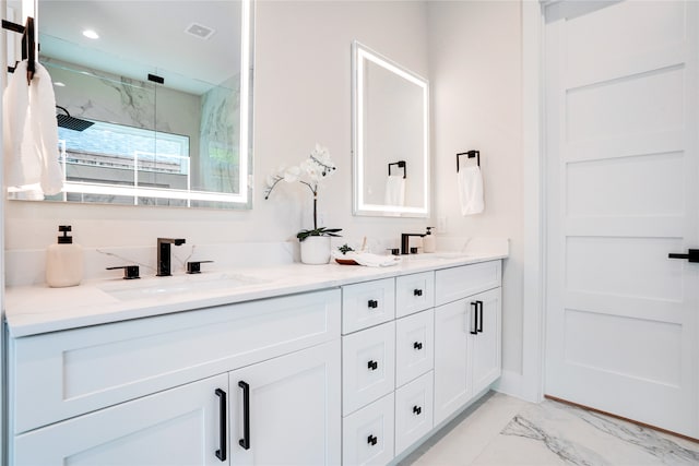 bathroom featuring tile flooring, double sink, and oversized vanity