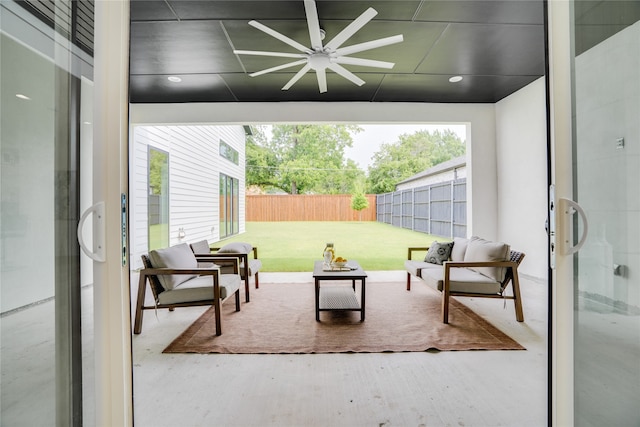 view of patio featuring an outdoor living space and ceiling fan