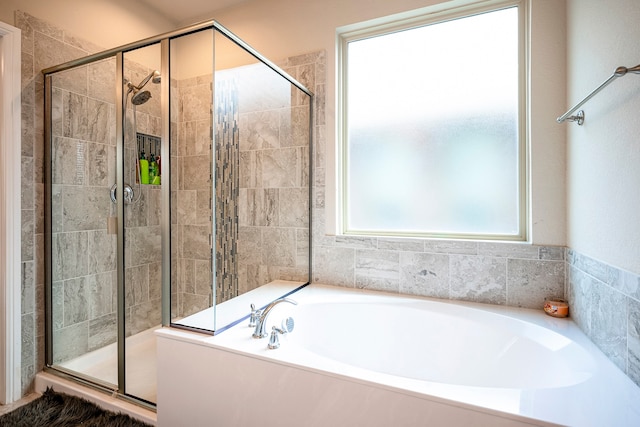 bathroom with independent shower and bath