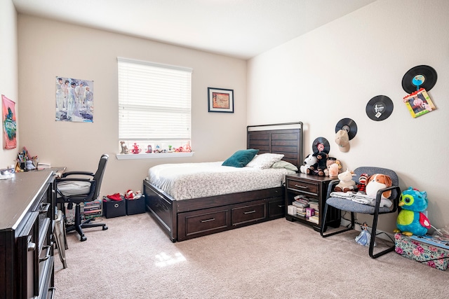 bedroom with light colored carpet