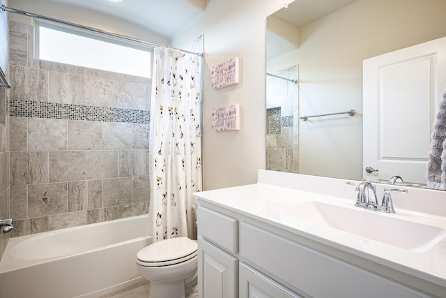 bathroom with toilet, shower / bathtub combination with curtain, and vanity