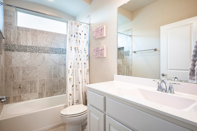 full bathroom featuring vanity, shower / bathtub combination with curtain, and toilet