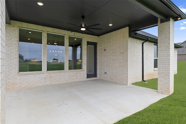 view of patio featuring ceiling fan