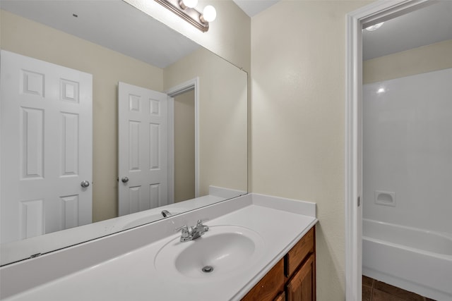 bathroom featuring tile patterned floors and vanity