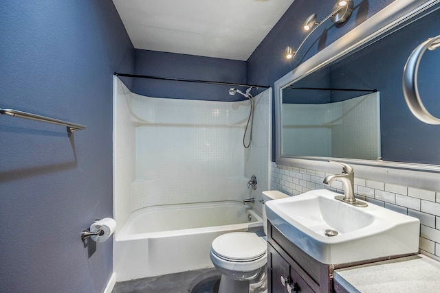 full bathroom with decorative backsplash, vanity, shower / bath combination, and toilet