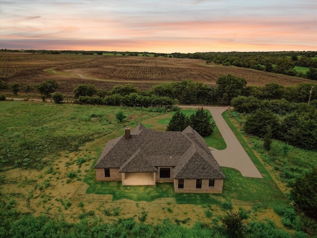 aerial view at dusk with a rural view