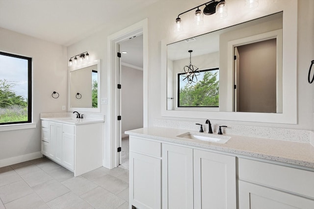 bathroom with vanity and tile patterned floors