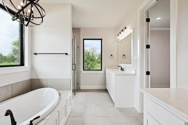 bathroom featuring vanity, crown molding, a healthy amount of sunlight, and separate shower and tub