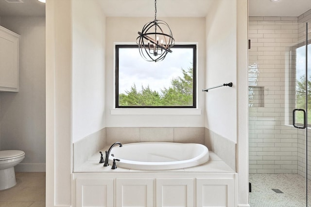 bathroom featuring a chandelier, toilet, separate shower and tub, and tile patterned flooring