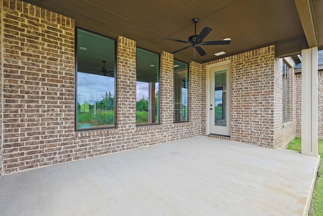 view of patio / terrace featuring ceiling fan