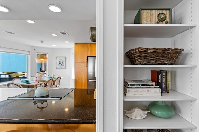 kitchen featuring stainless steel fridge