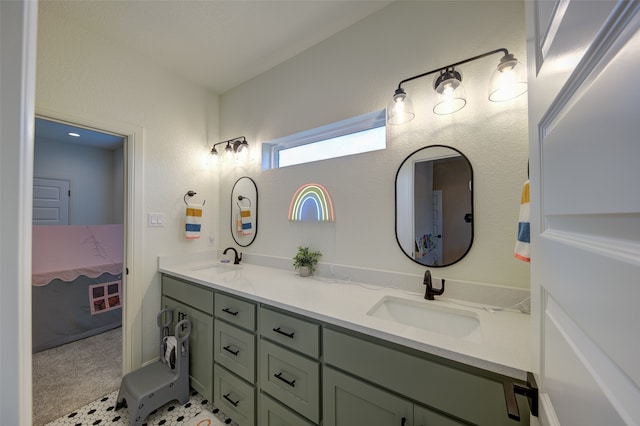 bathroom with dual vanity and tile flooring