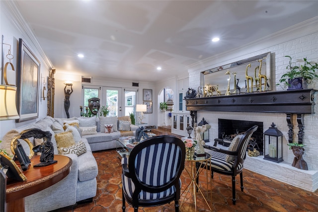 living room with french doors, brick wall, ornamental molding, and a fireplace