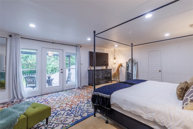 bedroom featuring carpet and access to outside